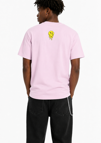 A man wearing a light pink t-shirt with a small yellow smiley face graphic on the upper back, shown from behind against a plain white background.